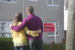 Couple looking at house for sale 